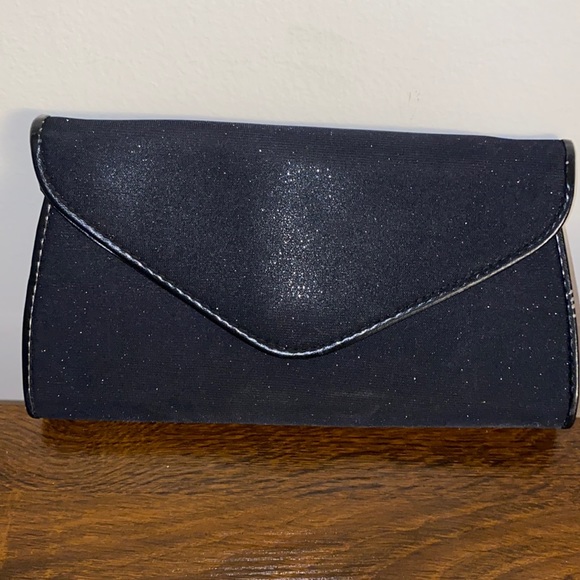 Chic Black Clutch with iridescent accents. - Picture 1 of 5